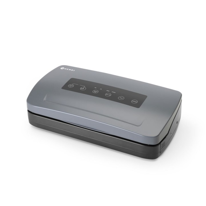 Machine à emballer sous vide avec distributeur de rouleaux